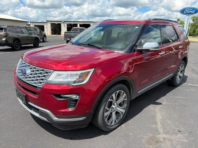 2019 Ford Explorer PLATINUM 4X4 in Ruby Red Metallic Tinted Clearcoat — front three-quarter view