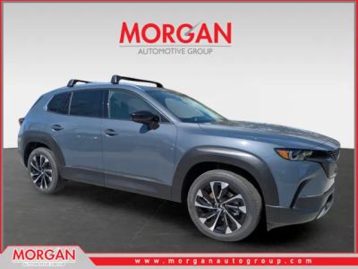 2026 Mazda CX-50 Hybrid Premium Plus in Polymetal Gray Metallic — front three-quarter view