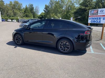2023 Tesla Model X — rear three-quarter view