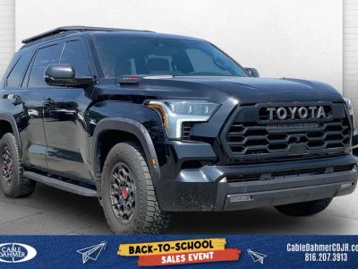2026 Toyota Sequoia TRD Pro in Midnight Black Metallic — front three-quarter view