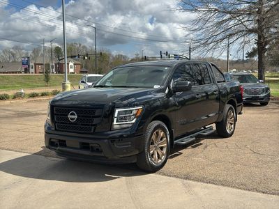 2024 Nissan TITAN — rear three-quarter view