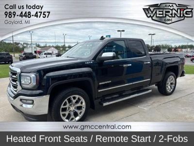 2016 GMC Sierra 1500 SLT in Onyx Black — front three-quarter view