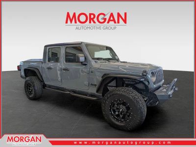 2026 Jeep Gladiator Sport S in Gray — front three-quarter view