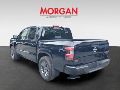 2026 Nissan Frontier — rear three-quarter view