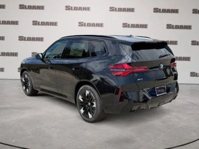 2026 BMW X3 — rear three-quarter view