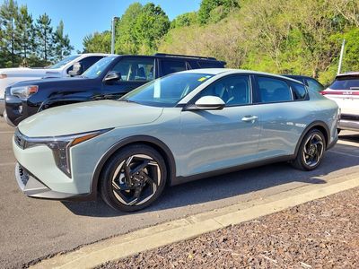 2025 Kia K4 EX in Morning Haze — front three-quarter view