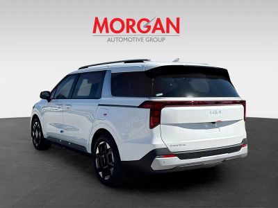 2026 Kia Carnival — rear three-quarter view