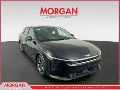 2025 Kia K4 LXS in Aurora Black Pearl — front three-quarter view