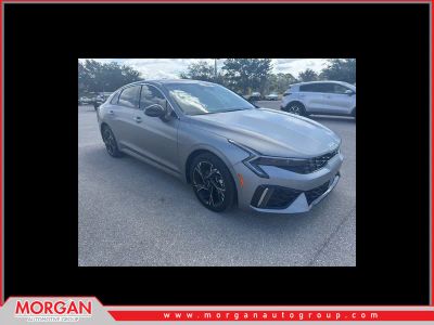 2025 Kia K5 GT-Line in Steel Matte Gray — front three-quarter view
