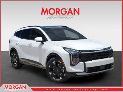 2026 Kia Sportage SX-Prestige in Glacial White Pearl — front three-quarter view