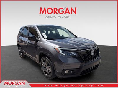 2021 Honda Passport EX-L in Modern Steel Metallic — front three-quarter view