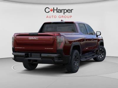 2026 GMC Sierra EV — rear three-quarter view