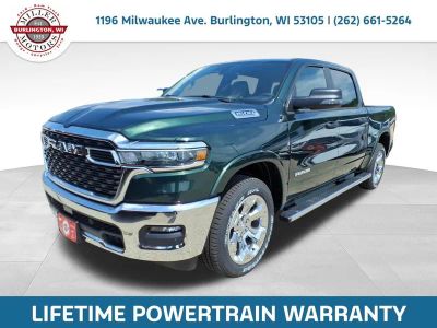 2026 RAM Ram 1500 RAM 1500 BIG HORN CREW CAB 4X4 5'7' BOX in Serrano-Green Metallic Exterior Paint — front three-quarter view