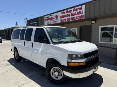 2014 Chevrolet Express 12 Passenger in White — front three-quarter view
