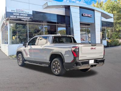 2026 GMC Sierra EV — rear three-quarter view