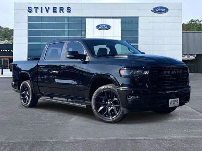 2026 Ram 1500 Laramie in Diamond Black — front three-quarter view
