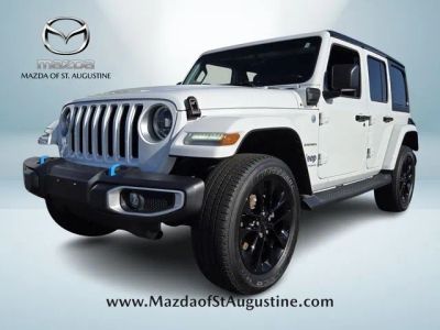 2023 Jeep Wrangler Sahara 4xe in White — front three-quarter view
