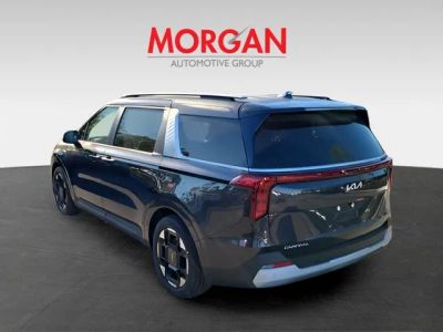 2026 Kia Carnival — rear three-quarter view