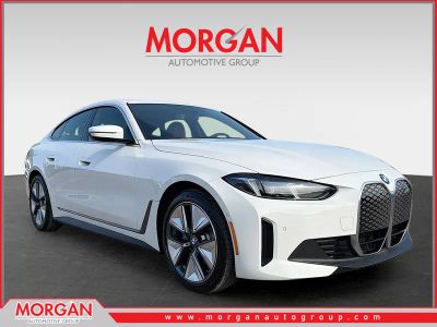 2026 BMW i4 eDrive40 in Alpine White — front three-quarter view