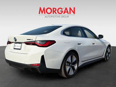 2026 BMW i4 — rear three-quarter view