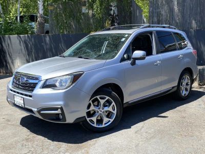 2017 Subaru Forester Touring in Sil/Silver — front three-quarter view