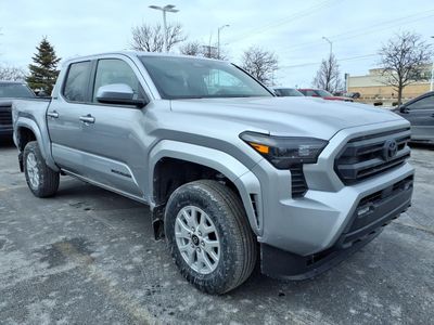 2026 Toyota Tacoma SR5 in Celestial Silver Metallic — front three-quarter view