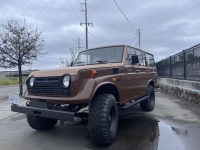 1971 Toyota Land Cruiser in Brown — front three-quarter view