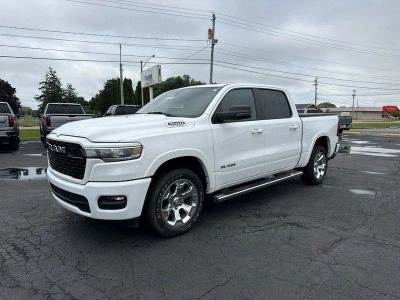2025 RAM 1500 Big Horn Crew Cab 4x4 5'7" Box in White — front three-quarter view