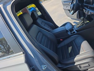 2024 Honda CR-V Hybrid Sport Touring RS6H9RKXW — front three-quarter view