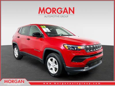 2023 Jeep Compass Sport in Red — front three-quarter view