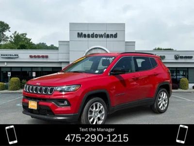 2023 Jeep Compass Latitude Lux in Redline Pearlcoat — front three-quarter view