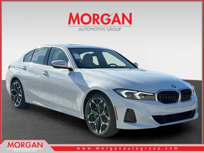 2026 BMW 3 Series 330i in Alpine White — front three-quarter view