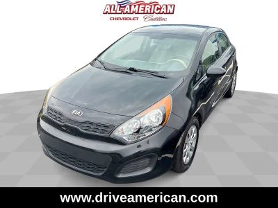 2013 Kia Rio LX in Aurora Black [Black] — front three-quarter view