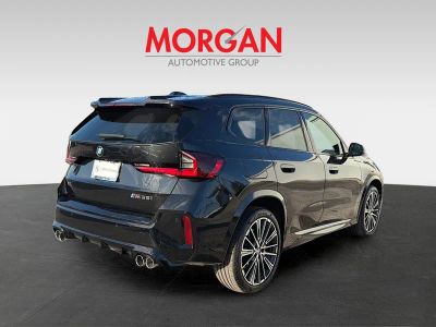 2025 BMW X1 — rear three-quarter view