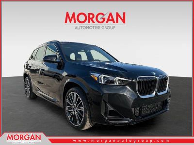 2025 BMW X1 M35i in Black Sapphire Metallic — front three-quarter view