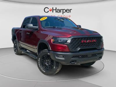 2025 RAM 1500 Rebel Crew Cab 4x4 5'7" Box in Red — front three-quarter view