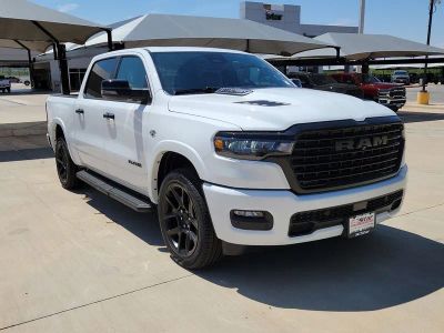 2026 RAM 1500 Laramie in Bright White Clearcoat — front three-quarter view