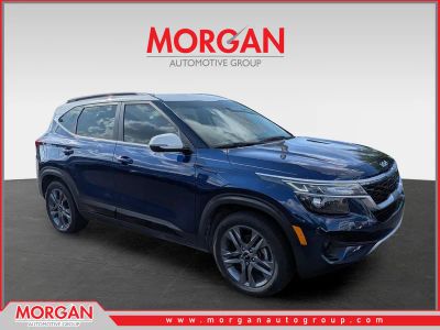2023 Kia Seltos S in Dark Ocean Blue/White Roof — front three-quarter view