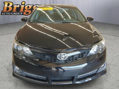 2013 Toyota Camry — side profile view