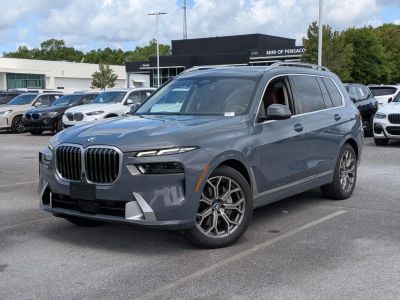 2023 BMW X7 xDrive40i in Brown — front three-quarter view