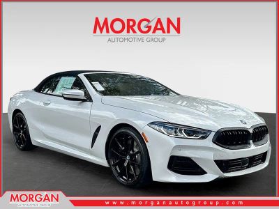 2026 BMW 8 Series 840i in Mineral White Metallic — front three-quarter view