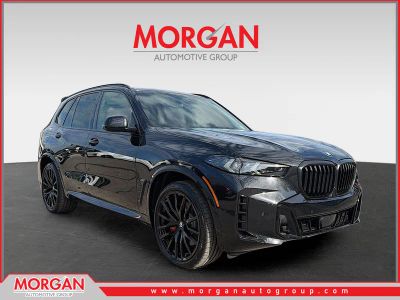 2026 BMW X5 sDrive40i in Black Sapphire Metallic — front three-quarter view