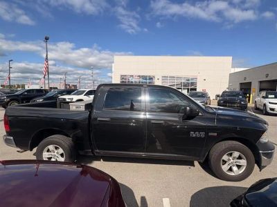 2017 RAM 1500 ST in Brilliant Black Crystal Pearl — front three-quarter view