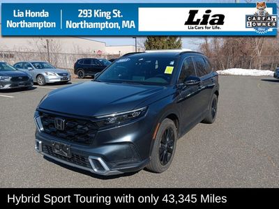 2023 Honda CR-V Hybrid Sport Touring — side profile view