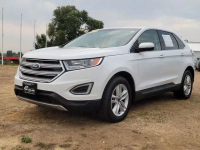 2017 Ford Edge SEL in White — front three-quarter view
