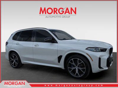 2026 BMW X5 M60i in White — front three-quarter view