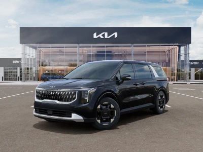 2026 Kia Carnival EX in Panthera Metal — front three-quarter view