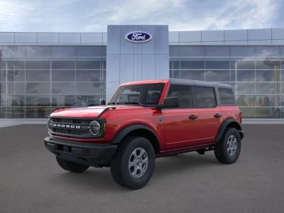 2026 Ford Bronco in Ruby Red Tinted — front three-quarter view