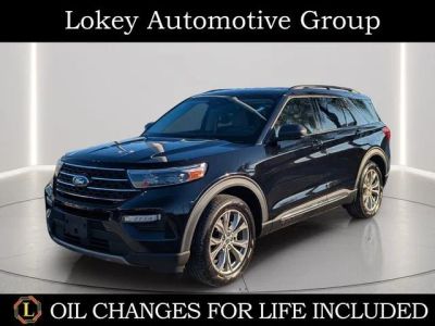 2023 Ford Explorer XLT in Agate Black Metallic — front three-quarter view