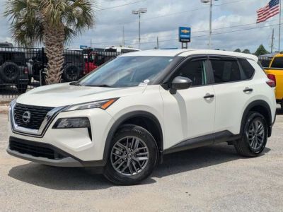 2023 Nissan Rogue S in White — front three-quarter view